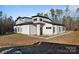 Stylish home with stone accents and a covered entryway at 15650 Youngblood Rd, Charlotte, NC 28278
