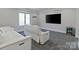 Home theater with comfortable seating and large screen at 15650 Youngblood Rd, Charlotte, NC 28278