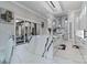 Luxury kitchen featuring marble island, stainless steel appliances, and breakfast bar at 15650 Youngblood Rd, Charlotte, NC 28278