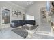 Spacious living room with plush sectional sofa and modern decor at 15650 Youngblood Rd, Charlotte, NC 28278