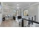Spacious home office with large windows and hardwood floors at 15650 Youngblood Rd, Charlotte, NC 28278