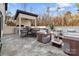 Outdoor patio with seating area, built-in grill, and modern design at 15650 Youngblood Rd, Charlotte, NC 28278