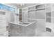 Spacious walk-in closet with custom shelving and island at 15650 Youngblood Rd, Charlotte, NC 28278