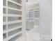 Large walk-in closet with ample shelving at 15650 Youngblood Rd, Charlotte, NC 28278