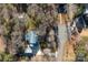 Bird's eye view of the home showing the roof, driveway, and yard at 161 Picwyck Dr, Mooresville, NC 28115