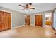 Bedroom with hardwood floors, ceiling fan, and closet at 161 Picwyck Dr, Mooresville, NC 28115
