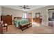 Comfortable bedroom with hardwood floors, a cozy bed, and ample storage with a wooden dresser at 161 Picwyck Dr, Mooresville, NC 28115