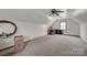 Spacious bonus room with neutral carpet, dormer window, ceiling fan, and large closet at 161 Picwyck Dr, Mooresville, NC 28115
