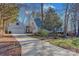 Traditional home with an attached garage and long driveway at 161 Picwyck Dr, Mooresville, NC 28115