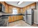 Well-equipped kitchen with stainless appliances, ample cabinet space and updated countertops at 161 Picwyck Dr, Mooresville, NC 28115