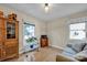 Sunlit bonus room features a cabinet and decorative plants at 161 Picwyck Dr, Mooresville, NC 28115