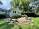 Stone patio with seating area adjacent to house at 1863 Hilltop Cir, Gastonia, NC 28054