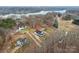 Aerial view showcasing home's location near lake at 243 Reese Wilson Rd, Belmont, NC 28012
