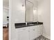 Bathroom with dark countertop and patterned floor at 243 Reese Wilson Rd, Belmont, NC 28012