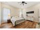 Spacious bedroom with wood floors and dresser at 243 Reese Wilson Rd, Belmont, NC 28012