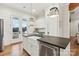 Kitchen with white cabinets, granite countertops, and a large island at 243 Reese Wilson Rd, Belmont, NC 28012