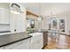 Modern kitchen with a farmhouse sink and breakfast area at 243 Reese Wilson Rd, Belmont, NC 28012