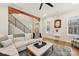 Spacious living room featuring a cozy sectional sofa and hardwood floors at 243 Reese Wilson Rd, Belmont, NC 28012
