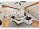 Open living space with a sectional sofa, hardwood floors, and kitchen views at 243 Reese Wilson Rd, Belmont, NC 28012