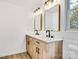 Double vanity bathroom with wood cabinets and quartz countertop at 250 Franklin Nw Ave, Concord, NC 28025