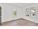 Well-lit bedroom with hardwood floors and neutral walls at 250 Franklin Nw Ave, Concord, NC 28025