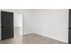 Spacious bedroom with hardwood floors and neutral walls at 250 Franklin Nw Ave, Concord, NC 28025