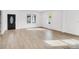 Bright living room featuring light hardwood floors at 250 Franklin Nw Ave, Concord, NC 28025