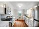 Bright kitchen with stainless steel appliances and hardwood floors at 2613 Armstrong Cir, Gastonia, NC 28054