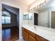 Bathroom with wood vanity, large mirror, and shower at 2748 Polo Club Blvd # 2, Matthews, NC 28105