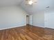 Spacious bedroom with hardwood floors and two closets at 2748 Polo Club Blvd # 2, Matthews, NC 28105