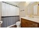 Cozy bathroom features a modern vanity with marble countertop and unique faucet at 3834 Sipes Ln, Charlotte, NC 28269
