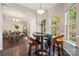 Cozy breakfast nook with natural light and an open floor plan to the dining room at 3834 Sipes Ln, Charlotte, NC 28269