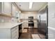 Modern kitchen featuring stainless steel appliances, sleek countertops, and ample cabinet space at 3834 Sipes Ln, Charlotte, NC 28269
