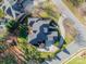 Aerial view of a house, pool, and surrounding landscape at 4150 Summit Ridge Ln, Denver, NC 28037