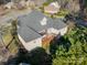 Aerial view of house showcasing backyard and deck at 4150 Summit Ridge Ln, Denver, NC 28037