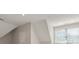 Bright attic space with dormer window, neutral paint, and recessed lighting at 4150 Summit Ridge Ln, Denver, NC 28037