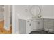 Bathroom featuring gray cabinets, quartz countertop, and gold hardware at 4150 Summit Ridge Ln, Denver, NC 28037