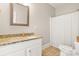 Bathroom with granite countertop, white cabinets and a shower/tub combo at 4150 Summit Ridge Ln, Denver, NC 28037
