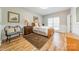 Cozy bedroom with hardwood floors and a wooden bed frame at 4150 Summit Ridge Ln, Denver, NC 28037