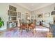 Bright dining area with large windows and seating for six at 4150 Summit Ridge Ln, Denver, NC 28037