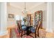 Formal dining room with chandelier and hardwood floors at 4150 Summit Ridge Ln, Denver, NC 28037