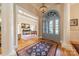 Elegant entryway with high ceilings and view to living room at 4150 Summit Ridge Ln, Denver, NC 28037