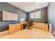 Bright home office features built-in shelving and window at 4150 Summit Ridge Ln, Denver, NC 28037