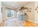 Charming kitchen nook with built-in cabinetry and hardwood floors at 4150 Summit Ridge Ln, Denver, NC 28037
