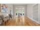 Bright living room with hardwood floors, large windows, and view to outside at 4150 Summit Ridge Ln, Denver, NC 28037