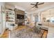 Spacious living room with stone fireplace and seating at 4150 Summit Ridge Ln, Denver, NC 28037