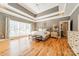 Luxurious main bedroom with high ceilings, hardwood floors, and ample natural light at 4150 Summit Ridge Ln, Denver, NC 28037