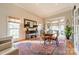 Sunroom with plenty of natural light and seating area at 4150 Summit Ridge Ln, Denver, NC 28037