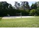 Sand volleyball court surrounded by trees at 4150 Summit Ridge Ln, Denver, NC 28037