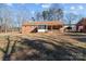 Large backyard with mature trees and a spacious lawn at 44339 Us 52 N Hwy, Richfield, NC 28137